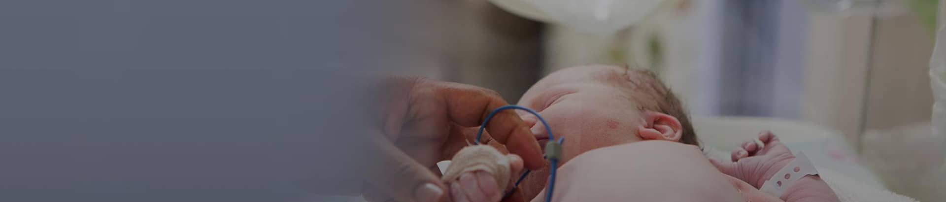 Infant resting in the NICU