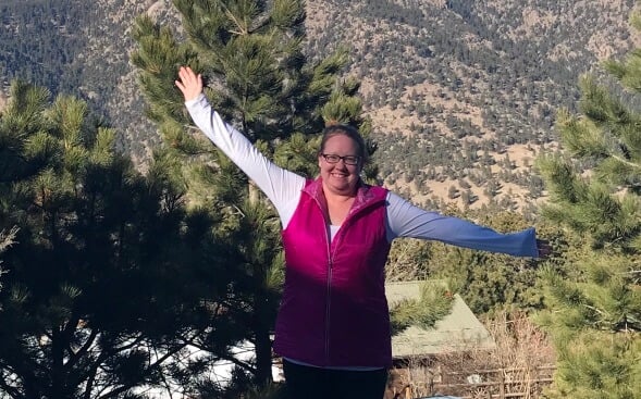 Anna Famiglietti, RN, with her arms spread wide Anna Famiglietti, RN, with her arms spread wide