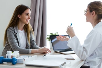 meeting or interview between woman and female healthcare professional meeting or interview between woman and female healthcare professional