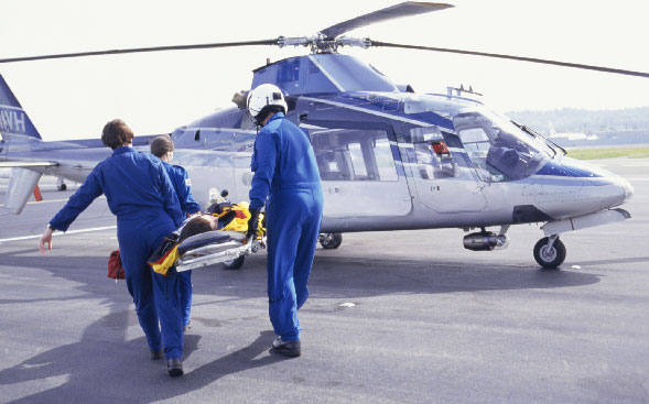 Nurses carry patient to helecopter Nurses carry patient to helecopter