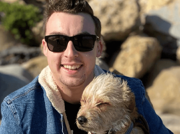 Billy Spencer, RN, with dog outside Billy Spencer, RN, with dog outside