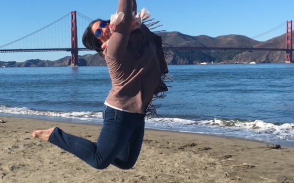 Brianne Carruthers leaping with Golden Gate Bridge in background Brianne Carruthers leaping with Golden Gate Bridge in background