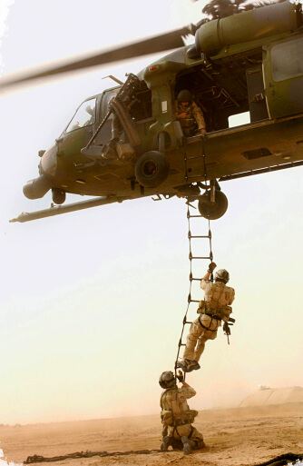 Military helicopter doing air evacuation Military helicopter doing air evacuation