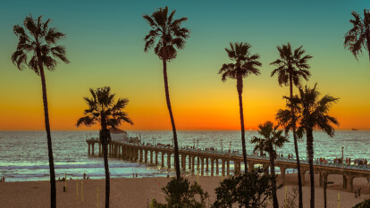 sunset at ocean with pier and sunset sky sunset at ocean with pier and sunset sky