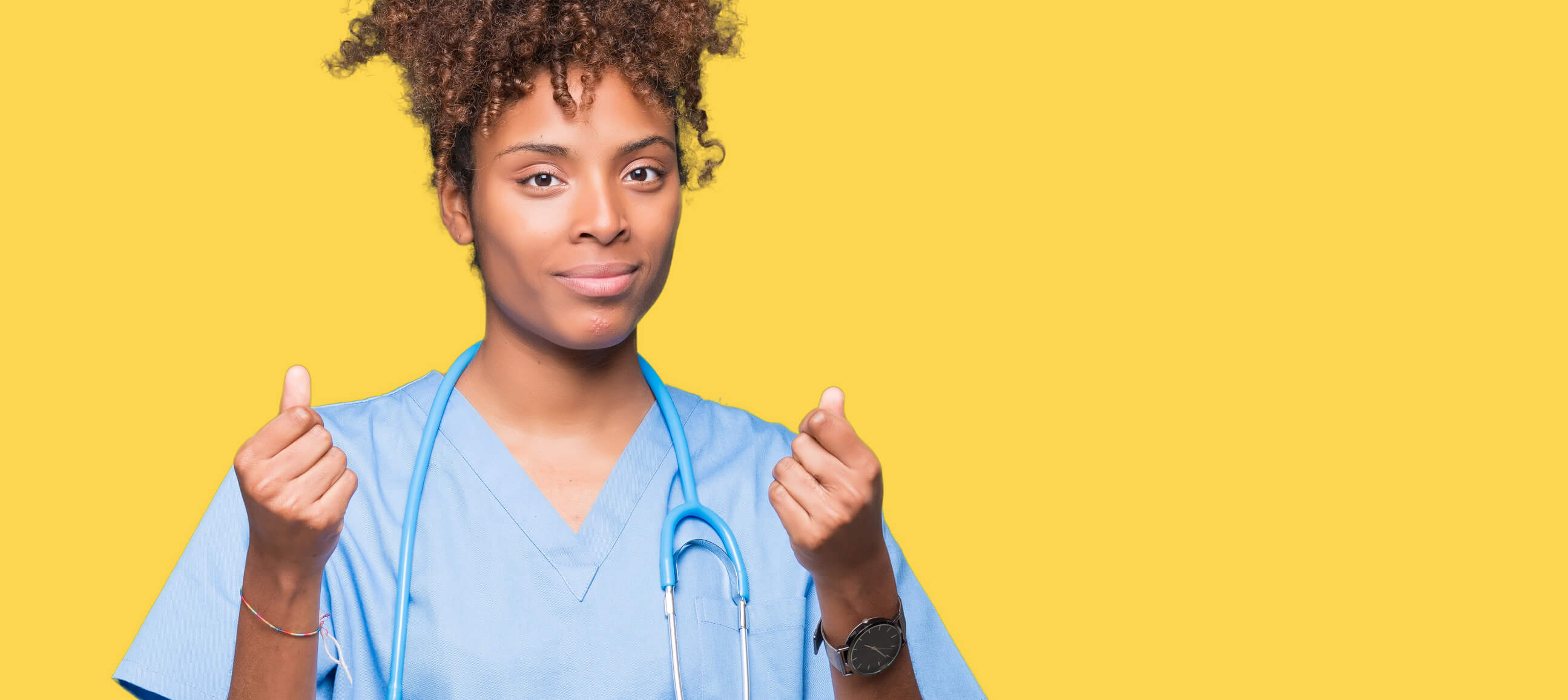 healthcare professionals holding fists chest level healthcare professionals holding fists chest level