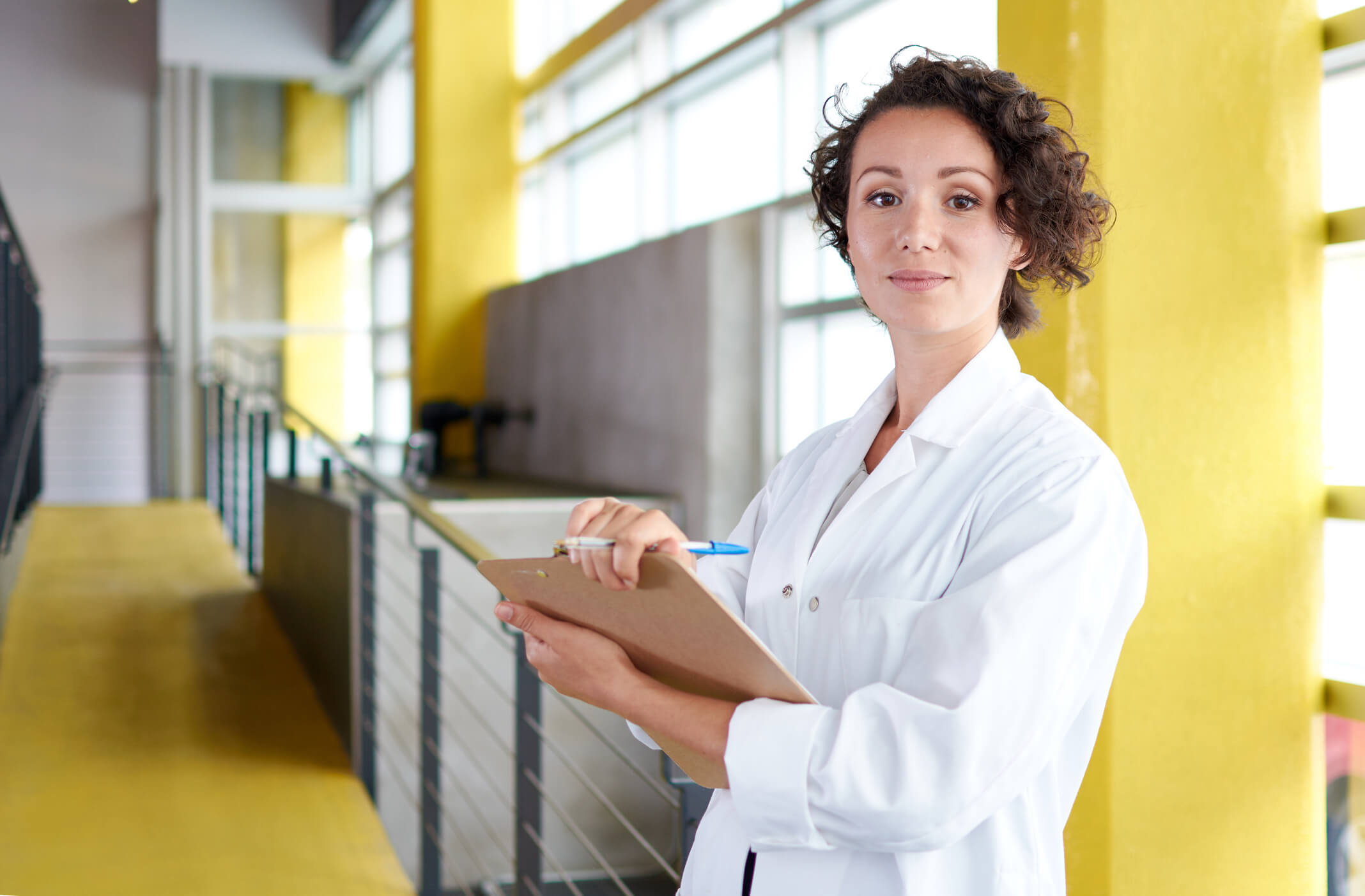 Healthcare professional holding clipboard Healthcare professional holding clipboard