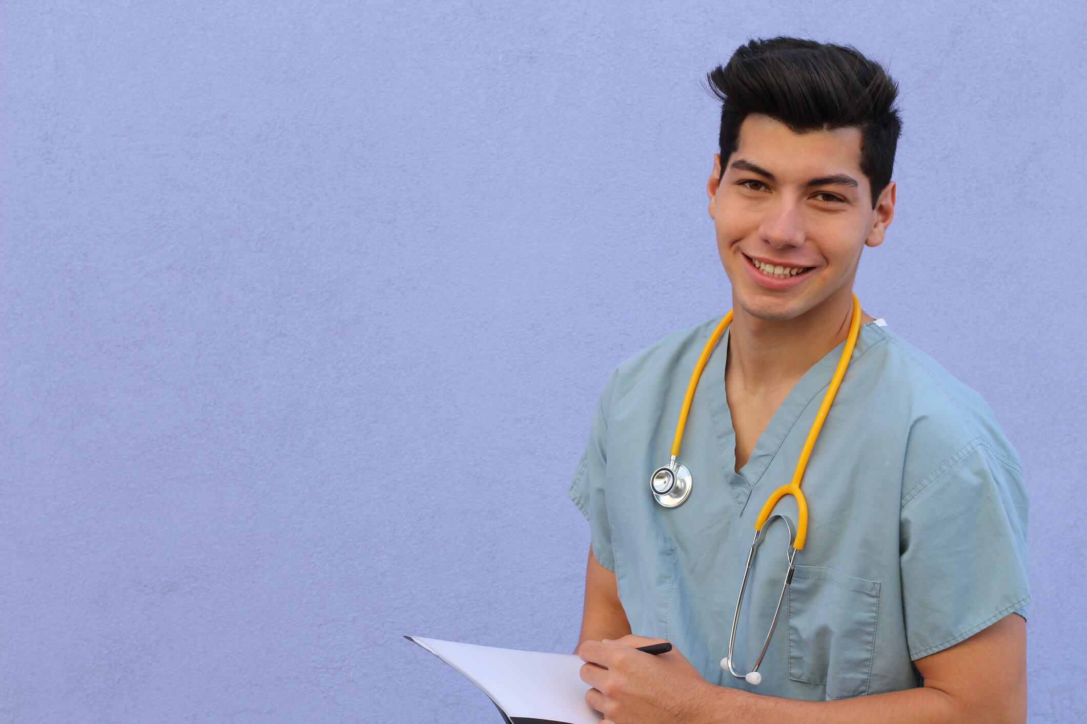 smiling young male nurse smiling young male nurse