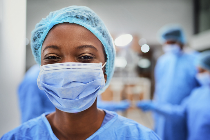 Happy nurse wearing face mask Happy nurse wearing face mask